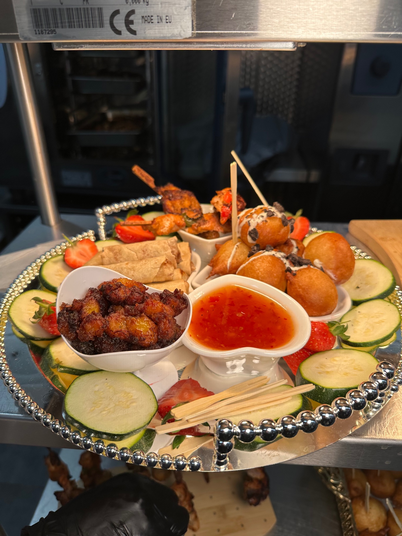 Adena's canapé platter with spring rolls, plantain and sweet chilli dip